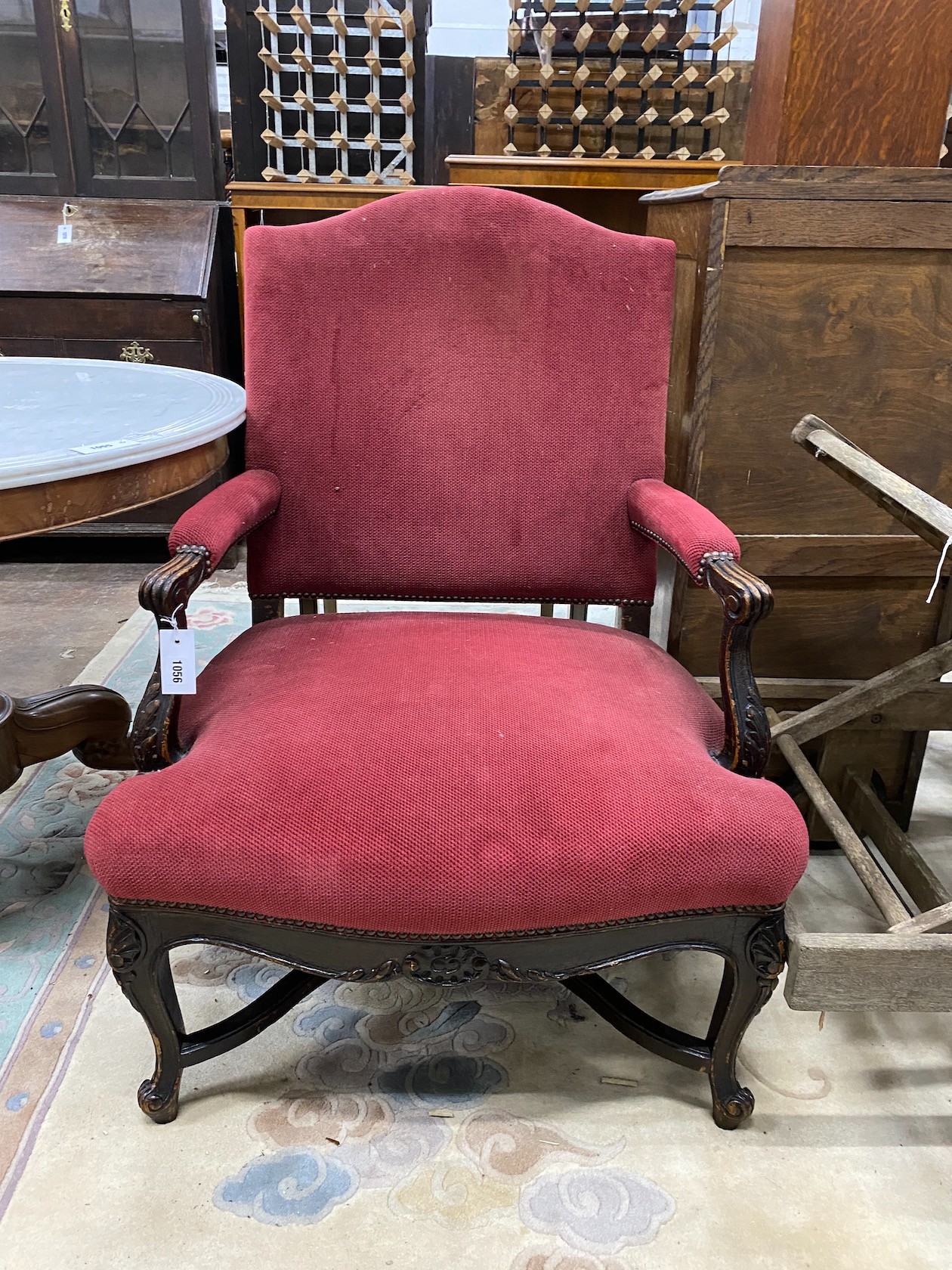 A 19th century French upholstered oak open armchair, width 72cm, depth 58cm, height 93cm